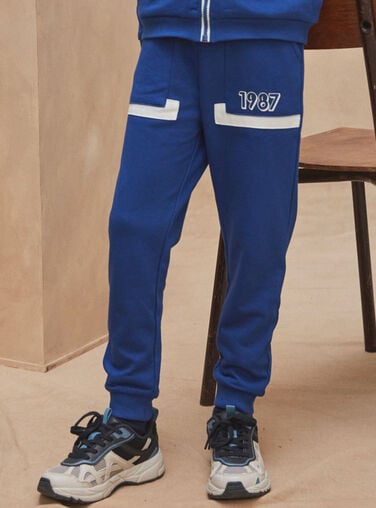 Promo Jogging bleu marine à imprimé fleuri enfant fille chez Sergent Major
